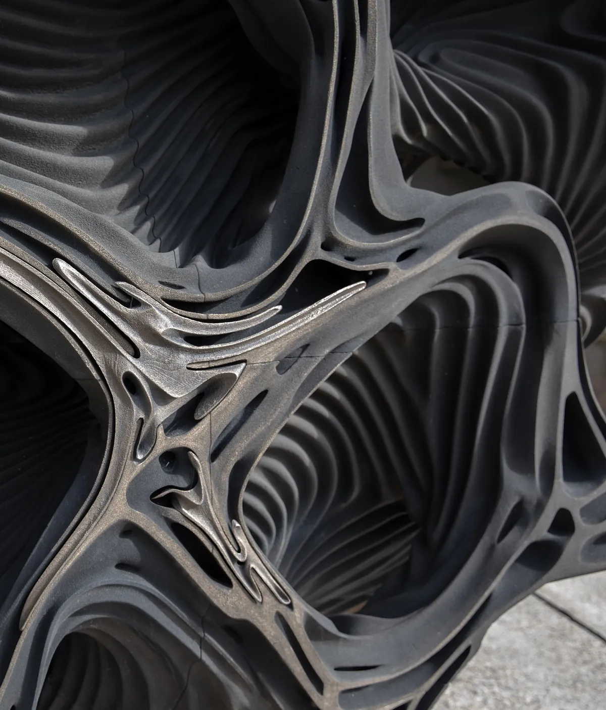 Close-up of the 3D-printed sandstone surface of Tectonic Resonance